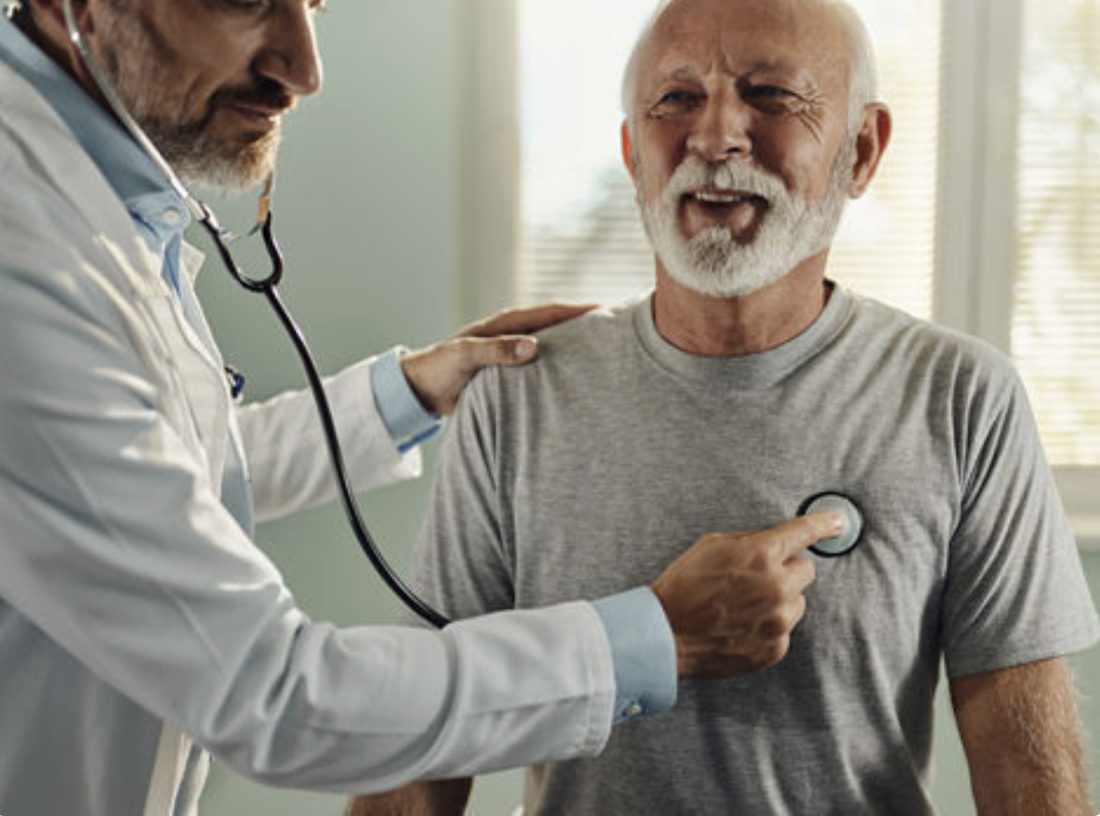 A care team member with a patient